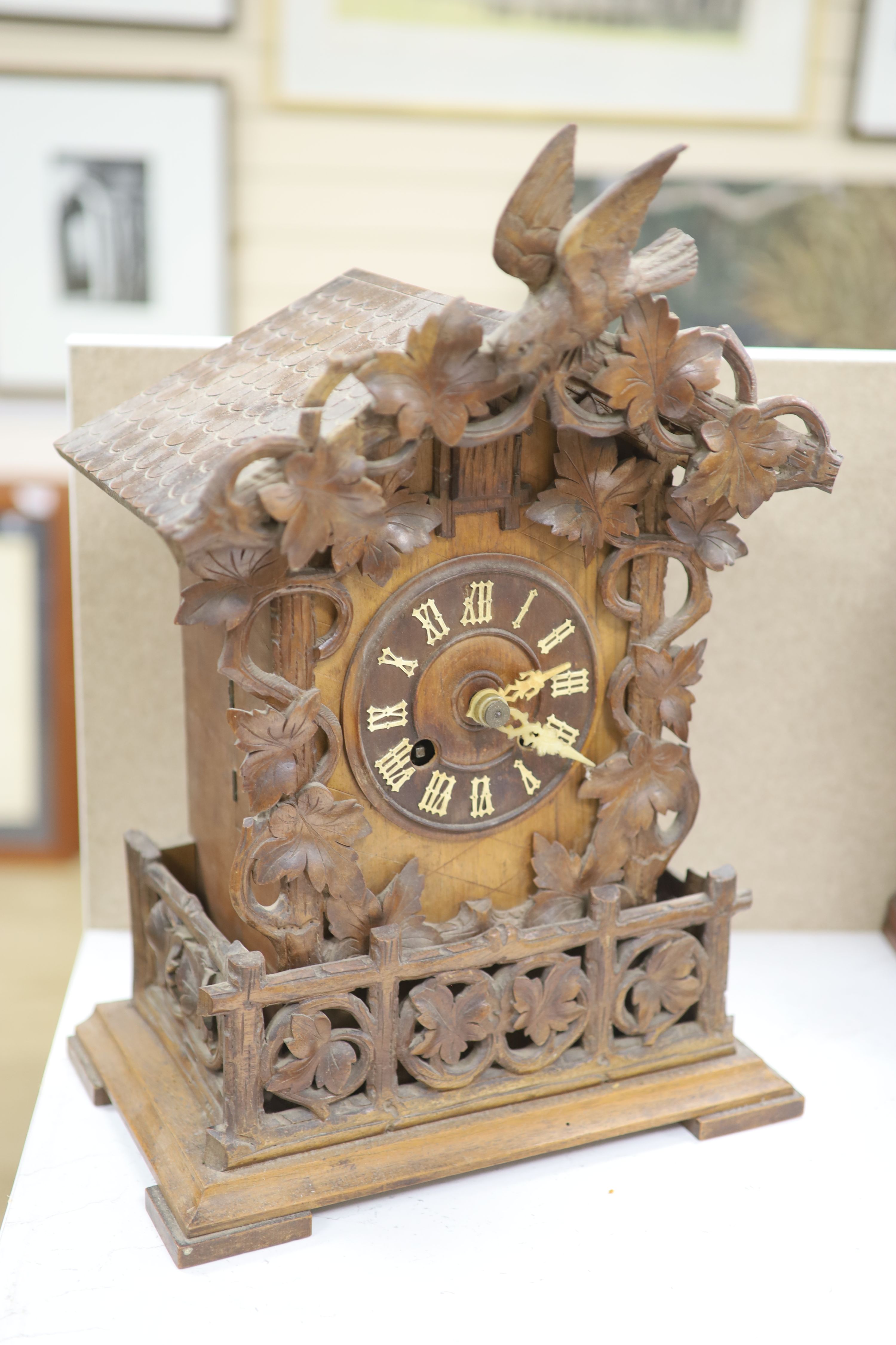 A late 19th century Black Forest cuckoo mantel clock, height 45cm